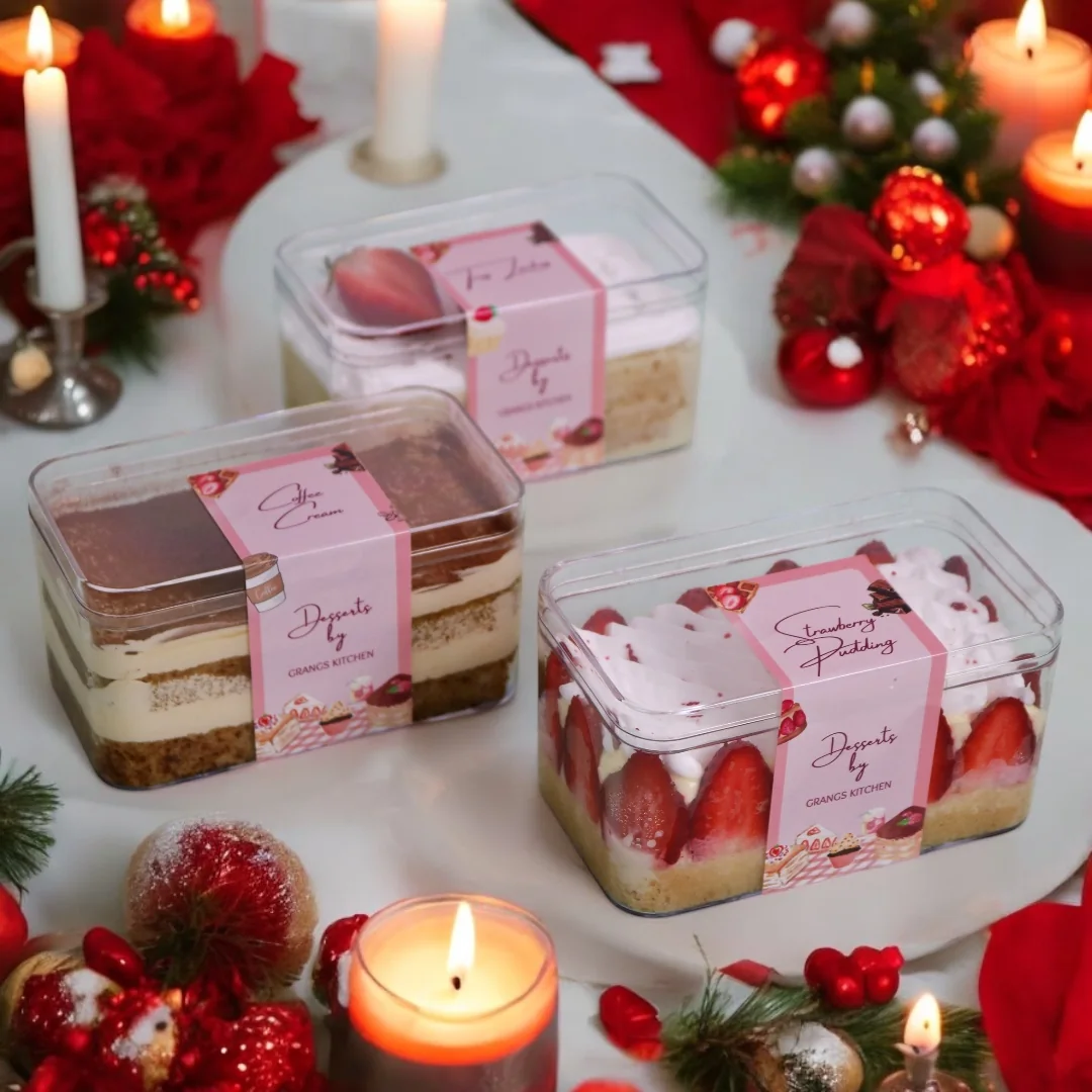 Christmas dessert jars and boxed treats arranged together
