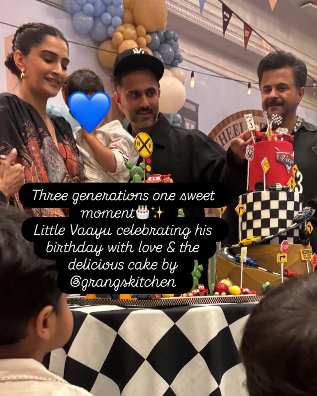 Family birthday celebration with a racing-themed cake