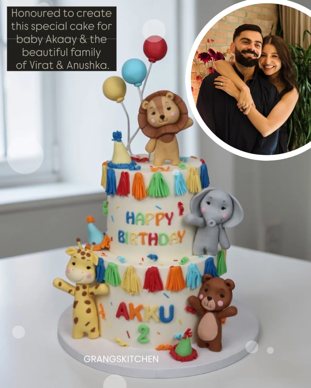 Animal-themed baby birthday cake with family photo inset