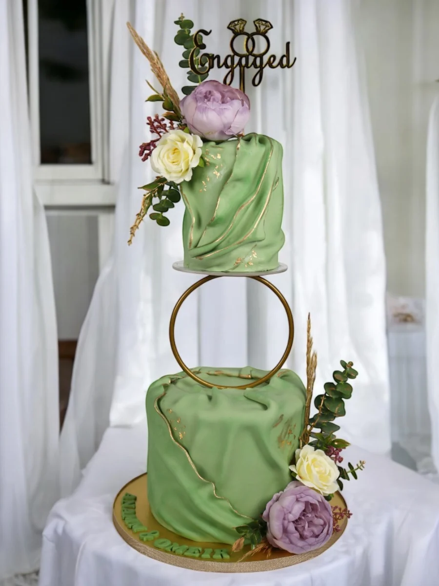 Green engagement cake with florals and gold details