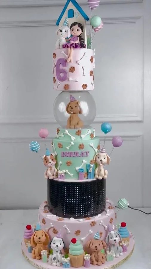 Custom rotating celebration cake with moving display element