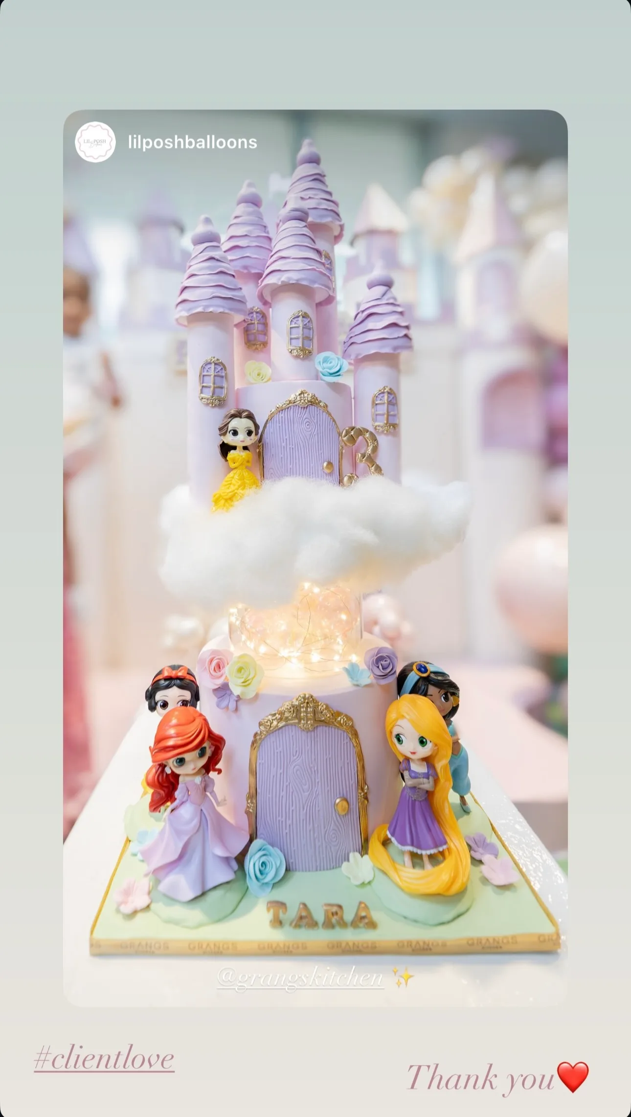 Princess castle cake with character figures and cloud details