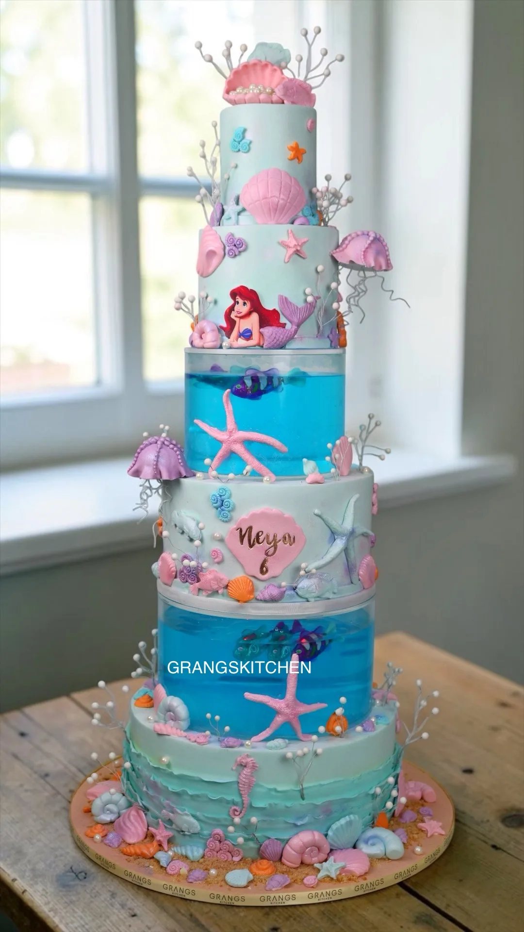 Underwater-themed kids cake with sea animals and coral details