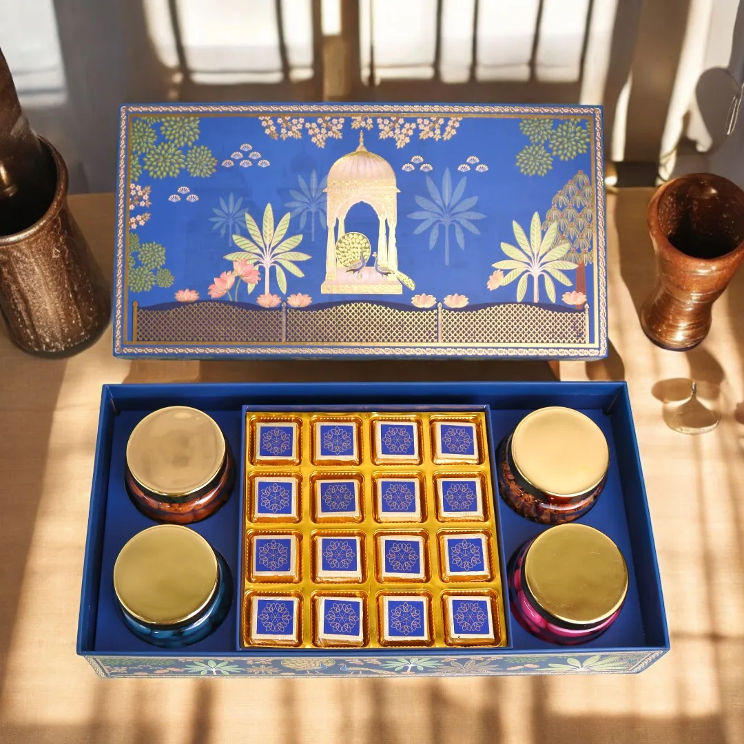 Blue and gold Diwali gift box with chocolates and festive jars
