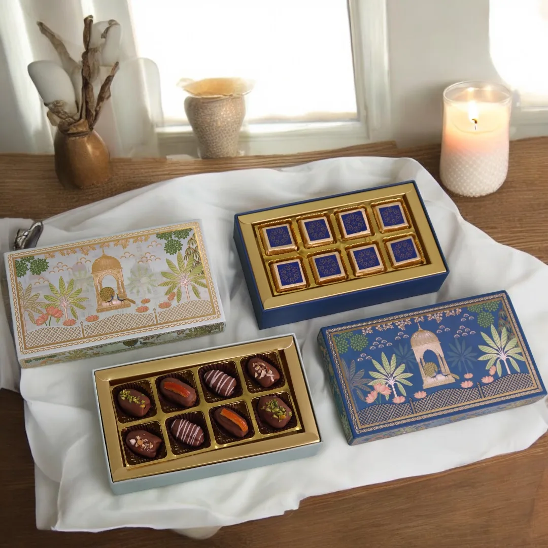 Diwali chocolate boxes arranged with blue and pink festive packaging