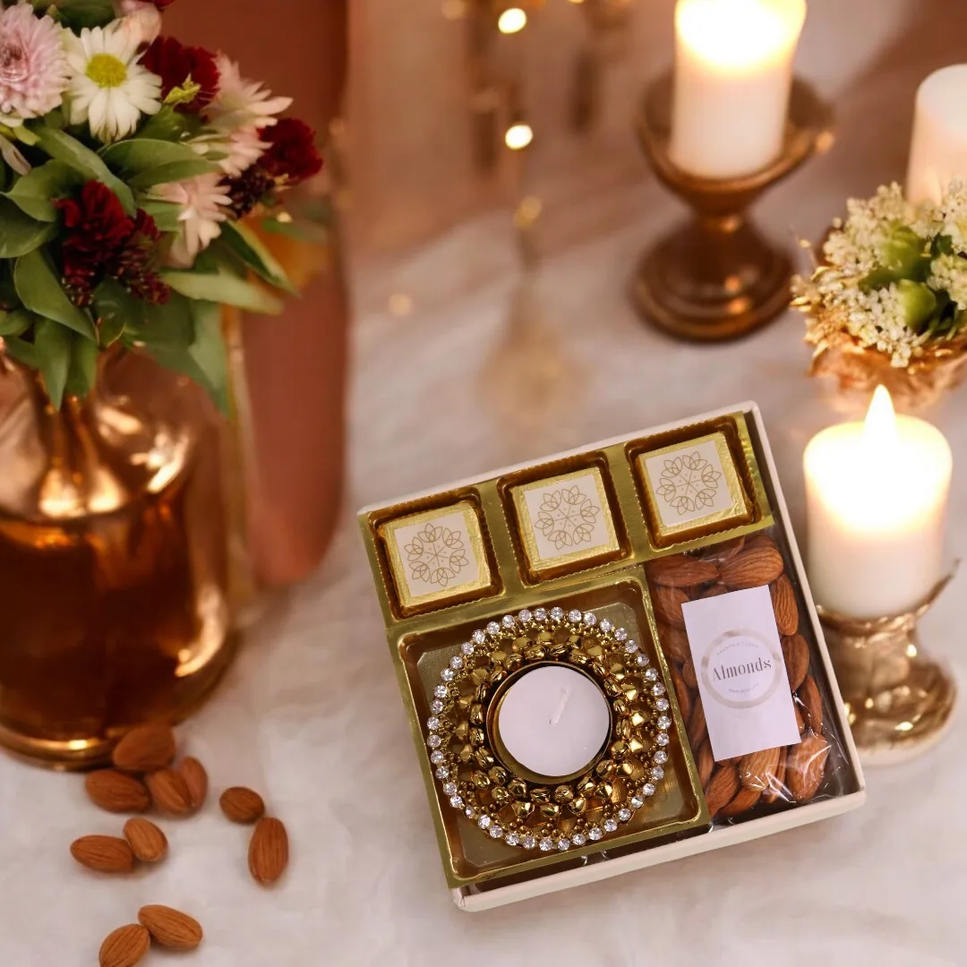 Diwali chocolate box with diya, almonds and festive packaging